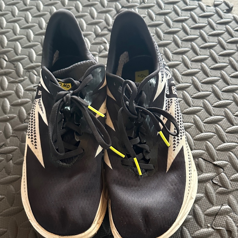 Hoka Black and White Women’s track shoes with Neon Accents